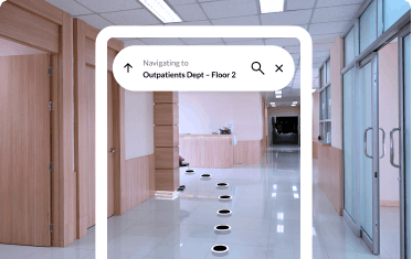A patient navigating to Outpatients Dept on floor 2 after scanning a QR code